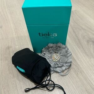 Tieks empty box, flower and pouch.